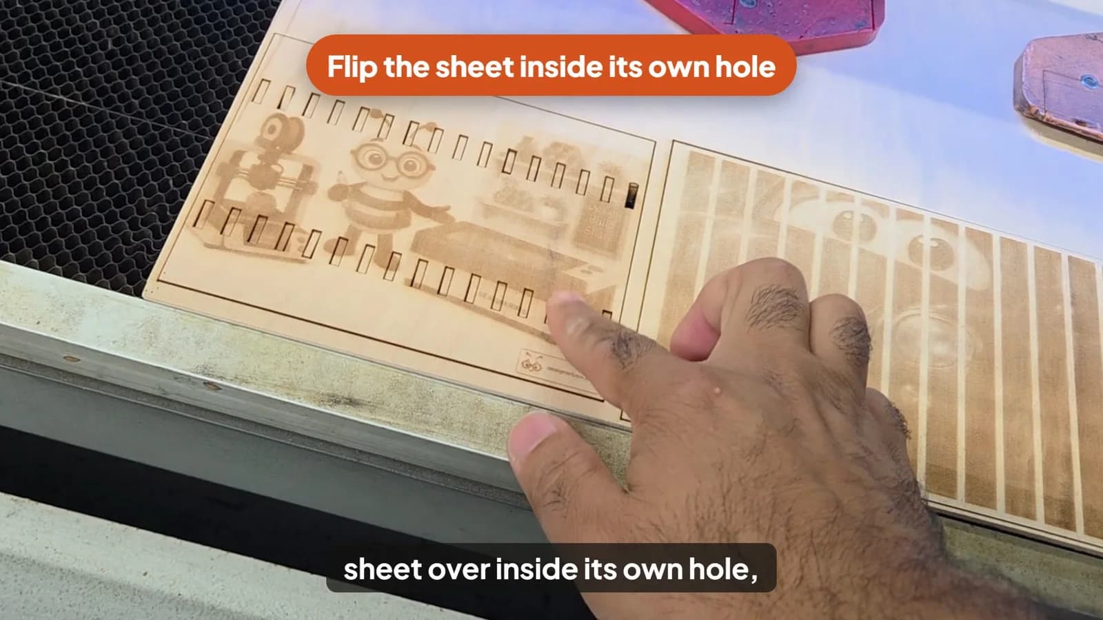 A frame from the how-to: a hand flipping a laser-cut sheet inside its own hole, with a callout and a caption
